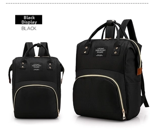 Detailed view of black Oxford fabric multi-functional backpack with durable gold zippers