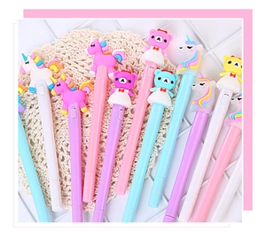 Close-up of cute cartoon unicorn and bear gel pens with light-up feature in pastel colors