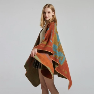 Close-up of geometric knit shawl with elegant drape and thick cashmere-like texture