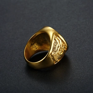 Close-up of golden eagle and star flag relief on stainless steel signet ring side