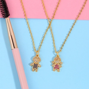 Sparkling boy and girl diamond pendant necklaces with colorful gems on gold chains