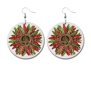 Detailed view of bohemian peace sign and sunflower teardrop earrings with leopard patterns