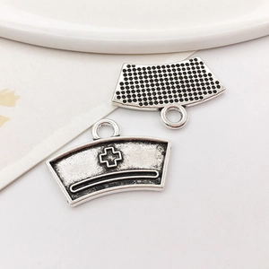 Silver nurse hat and medical trapezoid charms with top loops for DIY jewelry making