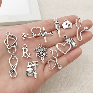 72-piece DIY silver alloy medical charms set featuring stethoscope and nurse hat pendants