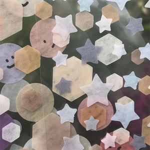 Assorted geometric washi stickers with stars and hexagons in soft muted colors