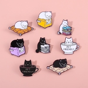 Set of 8 cute cartoon enamel cat brooches featuring kittens in tea cups and on pillows