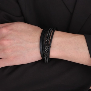 Men's multilayer black leather bracelet with braided stainless steel chains on wrist