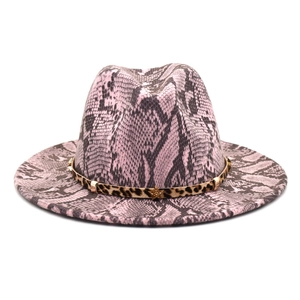 Detail of pink snake pattern wool fedora with leopard strap and gold star studs