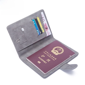 Gray RFID blocking passport holder with SIM card slots and ultra-thin travel document storage