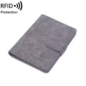 Sleek grey RFID blocking passport holder with snap closure and professional slim travel design