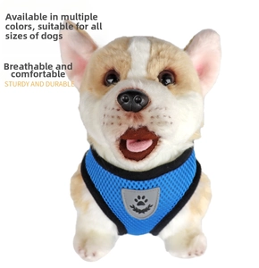 Close-up of blue mesh pet harness with gray shield logo on a Corgi model