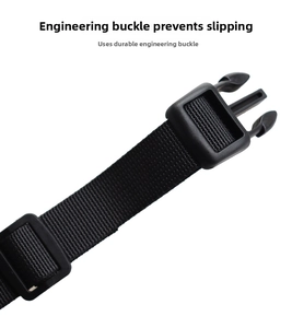 Detail of durable black nylon strap with heavy-duty plastic buckle for pet harness