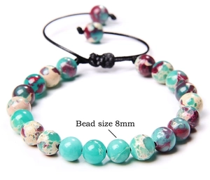 Close-up of 8mm natural stone beads on a handmade adjustable woven cord bracelet