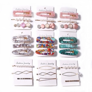 9-set variety pack of acetate and pearl hair clips with colorful geometric resin designs