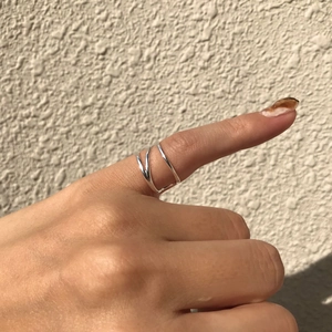 Minimalist 925 sterling silver triple layered wide open ring on model finger