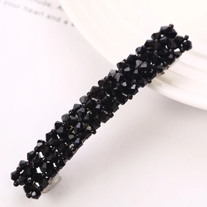 Elegant black faceted crystal beaded hair clip with silver base on white background