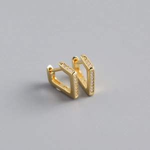 Detail of gold geometric square hoop earrings with sparkling pavé cubic zirconia