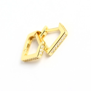 Elegant gold square huggie earrings with small sparkling diamonds on a white background