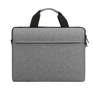 Minimalist grey laptop bag with black handles and zippered front pocket on white background