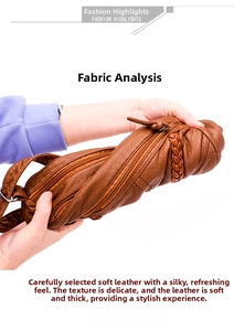 Detail view of brown pebbled leather crossbody bag showing softness and multi-zipper pockets