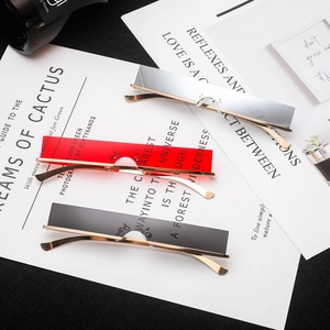Modern narrow rimless rectangle sunglasses with gold metal frames in three vibrant colors