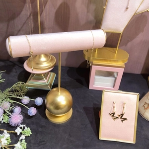 Pink velvet and gold metal jewelry display stand set for necklaces and earrings