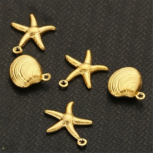 Golden stainless steel starfish and seashell pendants for DIY jewelry and crafts