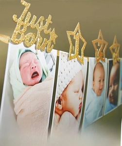 Nahaufnahme der glitzernden Just Born Girlande und Stern-Fotoclips für Baby-Geburtstage