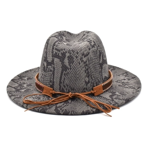 Fedora hat with grey snake print and brown suede braided band on a white background