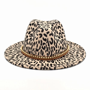 Close-up of leopard print fedora with brown woven band and gold bead accents