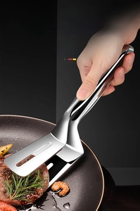 Detail of 304 stainless steel food tongs with slotted spatula for draining oil