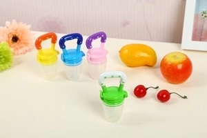 Baby fruit feeders in green, blue, purple, and orange colors with silicone nipples