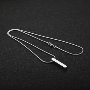 Minimalist silver stainless steel bar pendant necklace with a sleek snake chain design