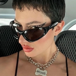 Y2K millennium style black wrap sunglasses and silver bone pendant chain necklace