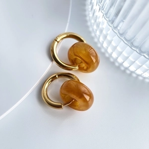 Minimalist 18k gold plated stainless steel hoops with amber stone resin pendants