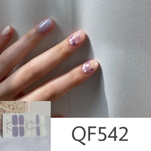 Detail of purple matte daisy nail stickers with glitter and star patterns style QF542