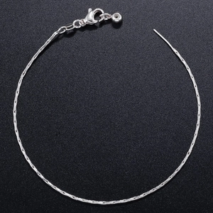 Elegant silver snake chain necklace with lobster clasp and bead pendant on black texture