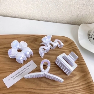 Iridescent mermaid flower hair claw clips set in acrylic for elegant women's hairstyling
