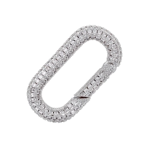Silver oval jewelry clasp with sparkling zircon pavé setting on a clean white background