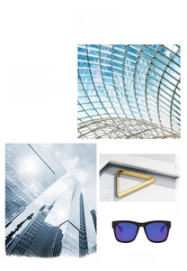 Detail of black bold frame sunglasses with blue gradient lenses and gold triangle accent