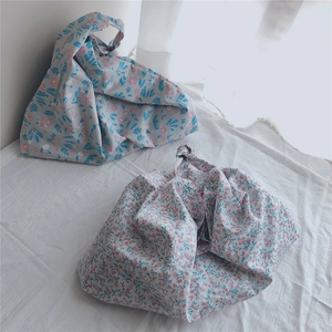 Floral cotton fabric shoulder bags with Japanese knot handle design on white linen fabric