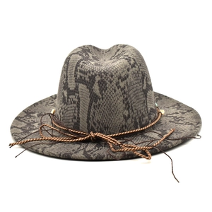 Wide brim fedora hat with snakeskin print and bohemian beaded rope decoration