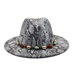 Detail of grey snake print wool fedora with bohemian ethnic band and turquoise beads