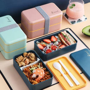 Three-layer stacked bento boxes with cutlery sets and elastic straps in multiple colors