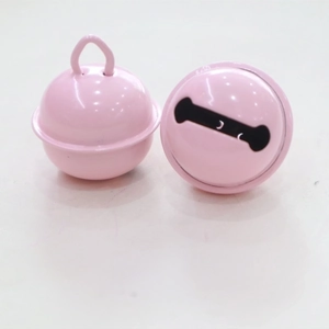 Pair of 22mm pink painted metal pet bells with bone-shaped cutouts and hanging rings
