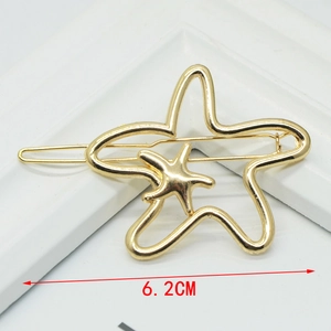 Close-up of golden metal starfish hair clip with 6.2cm double hollow design detail