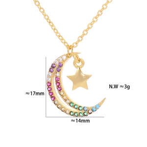 Close-up of star and moon pendant with colorful crystals and exact size measurements
