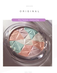 Macro shot of multi-color highlighter powder with geometric diamond texture in a round case