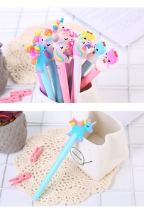 Close-up of cute light-up cartoon gel pens with unicorn and bear silicone toppers
