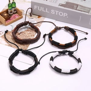 Four-piece set of woven leather bracelets in black and brown with adjustable cords